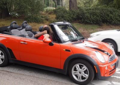 Couple Kissing in Sports Car